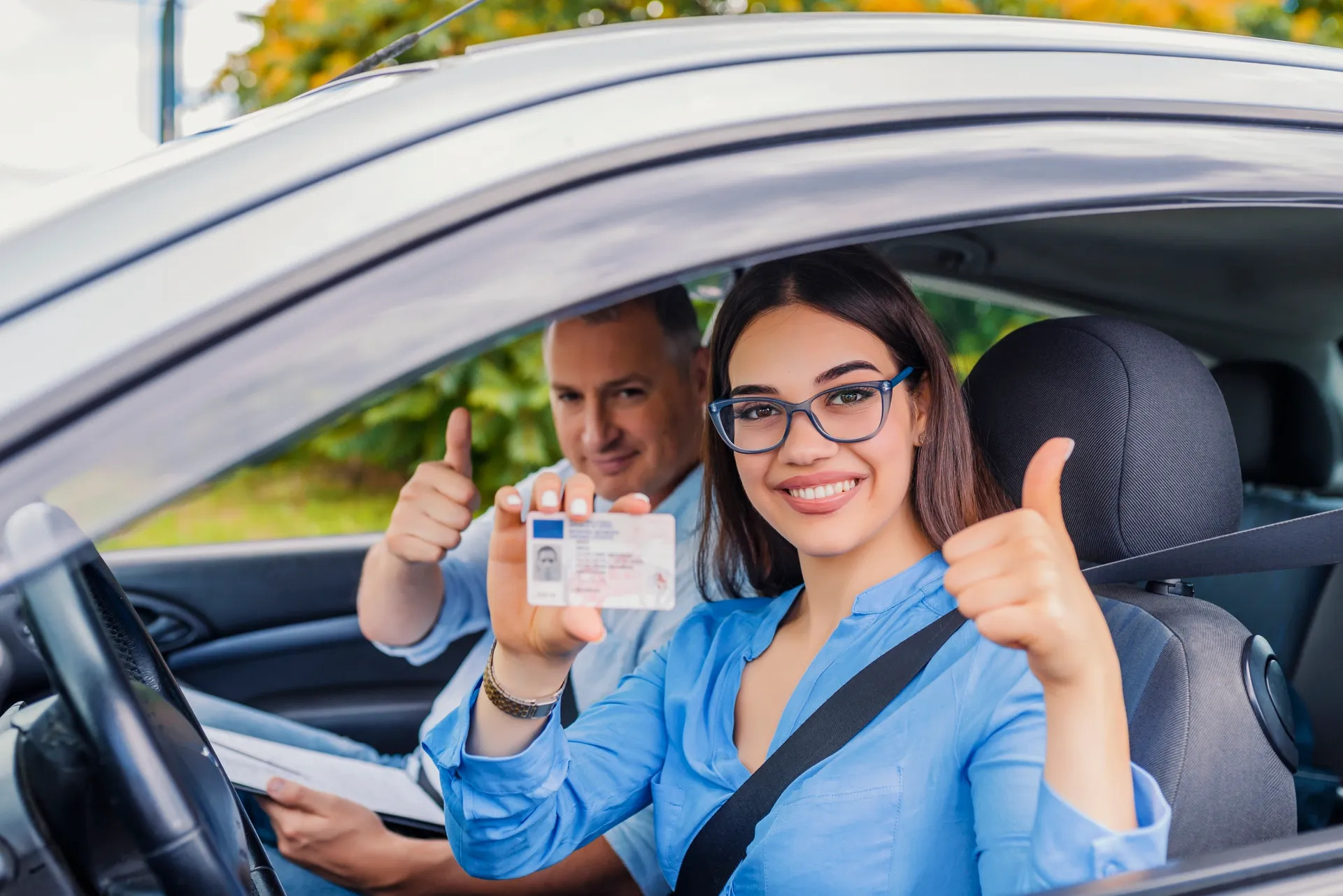 Student smiling after passing DMV test